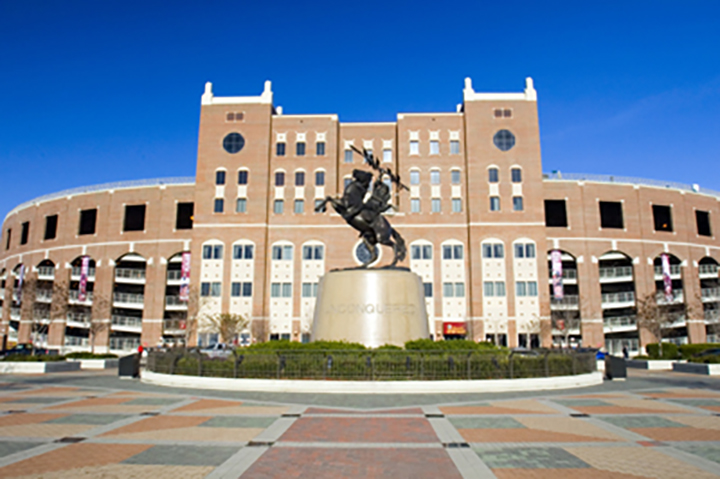 Photo of University Center B and the Unconquered statue