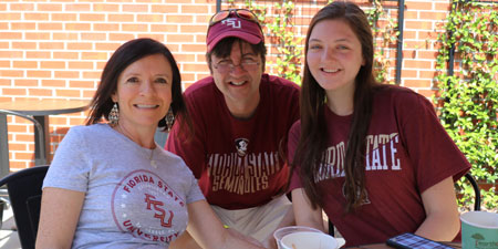 Photo of a family enjoying Family Weekend events